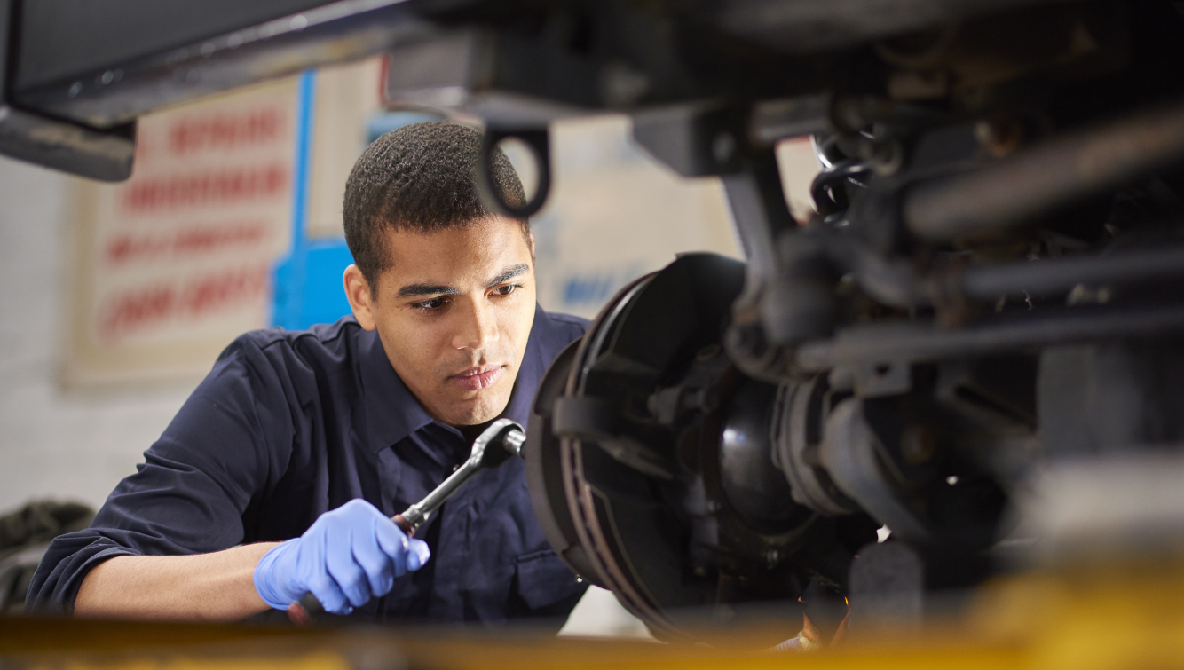 man working on a car