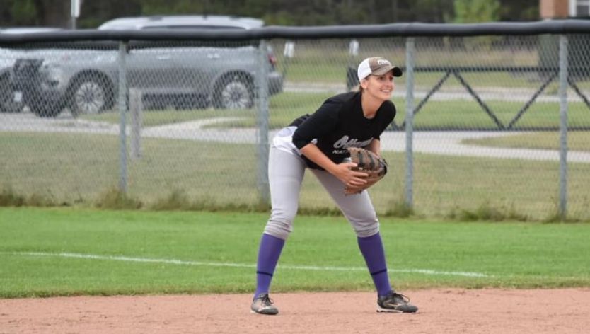 Cpl Cassandra McNichol playing slo-pitch