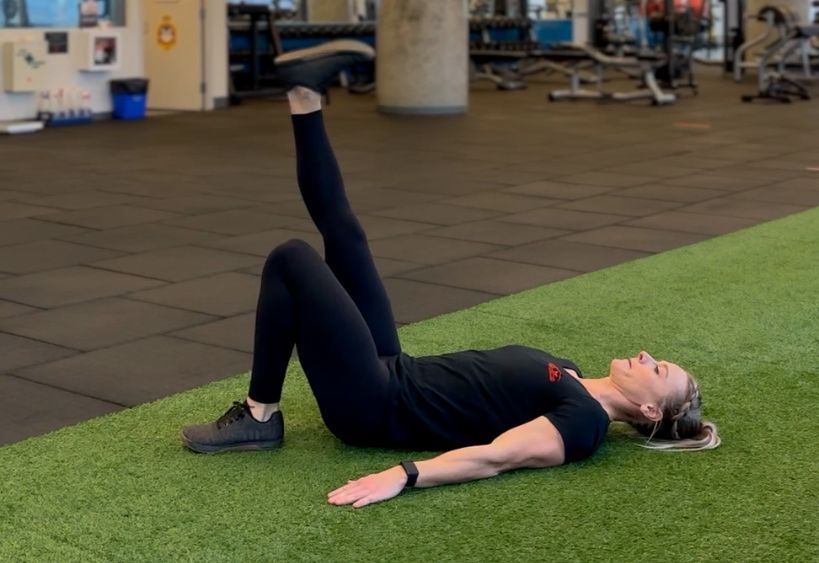 Fitness instructor doing exercise