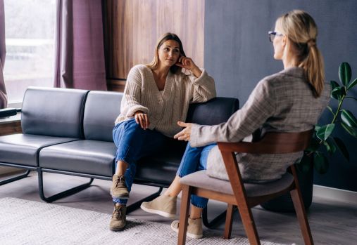 women talking in office