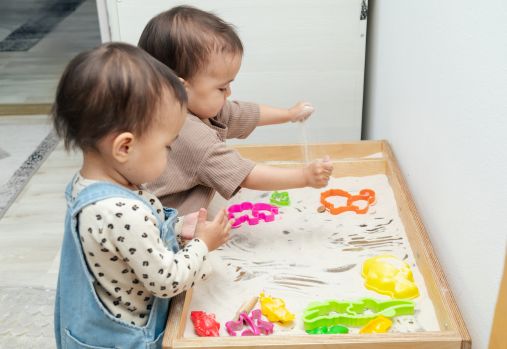 children playing with sand