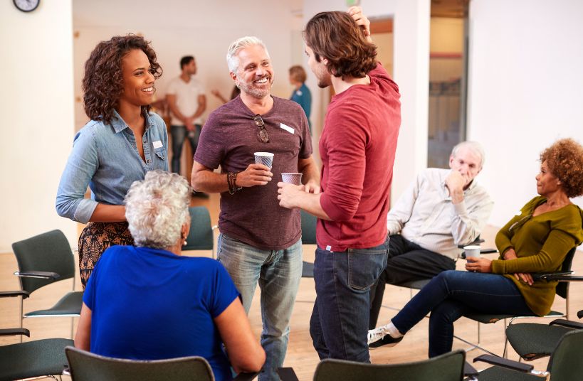 les personnes présentes à une réunion communautaire