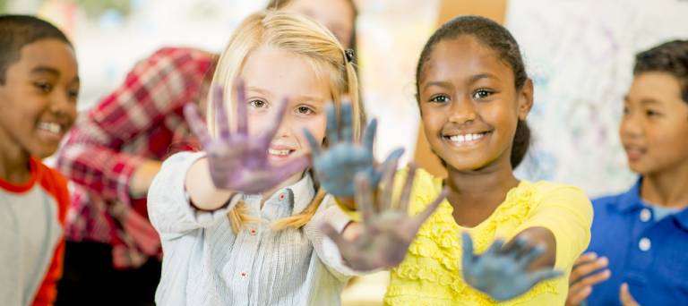 children with painted hands