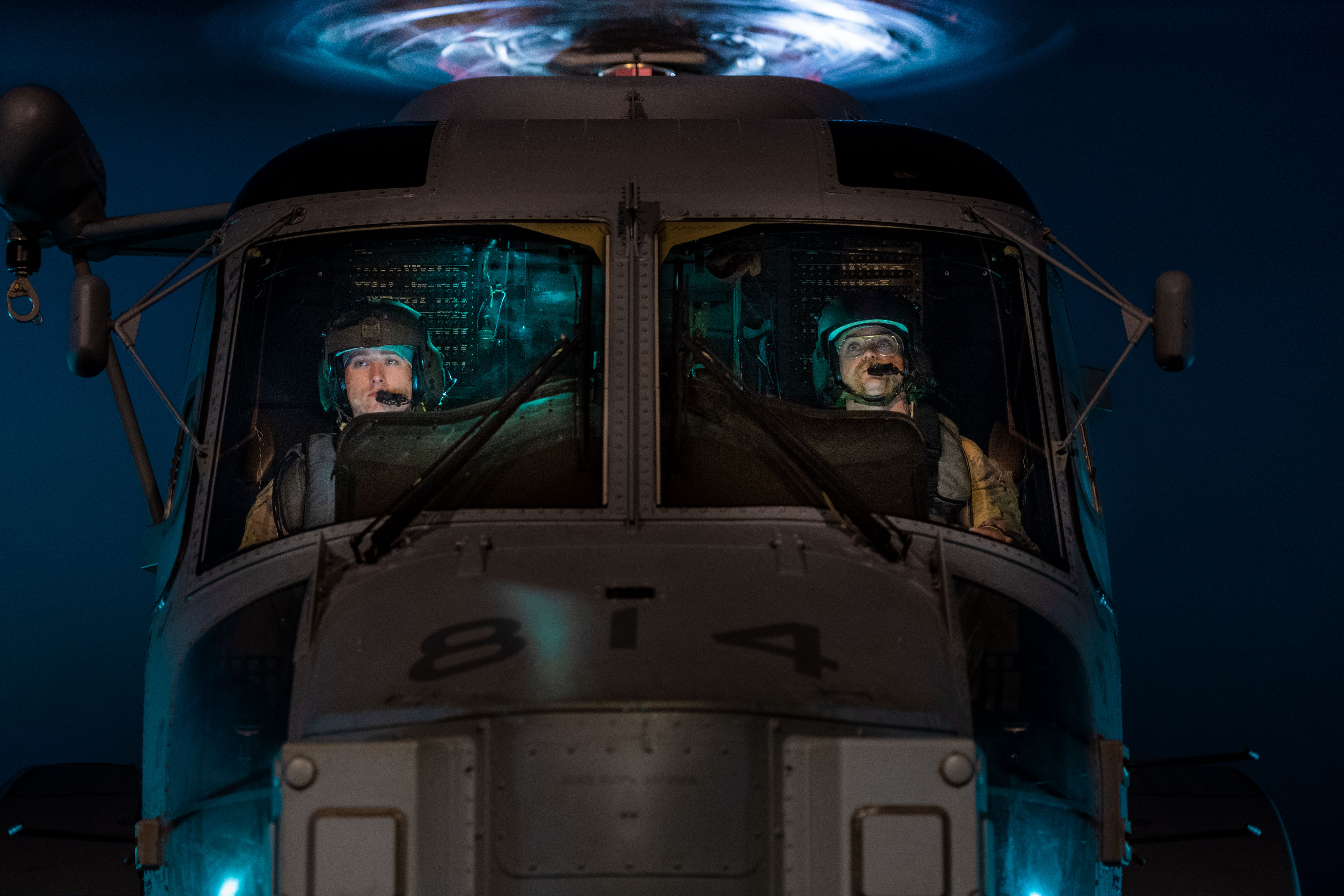 2 men in a helicopter