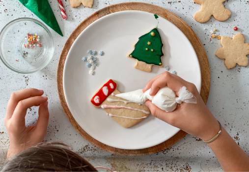 Girl decorating cookies