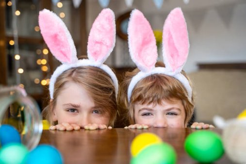 two children with bunny ears